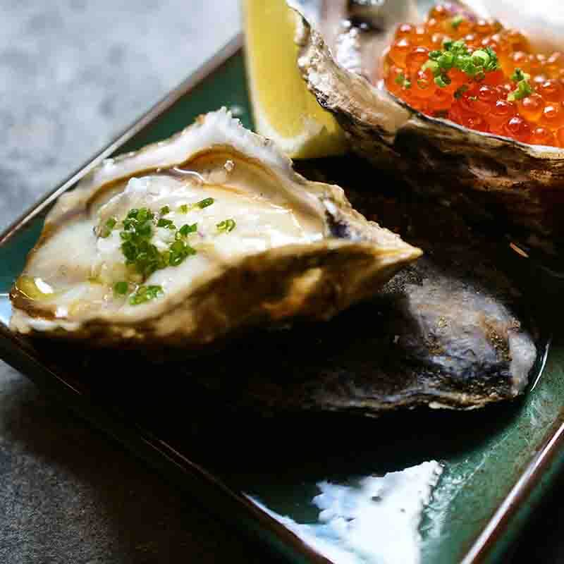 Malpeque Oyster on Plate with Caviar Beside Oyster